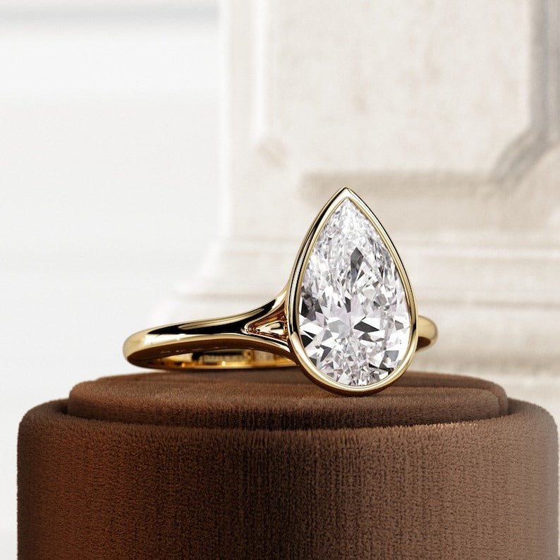 Carat E VVS2 Pear Lab Grown Diamond Bezel Set Ring
