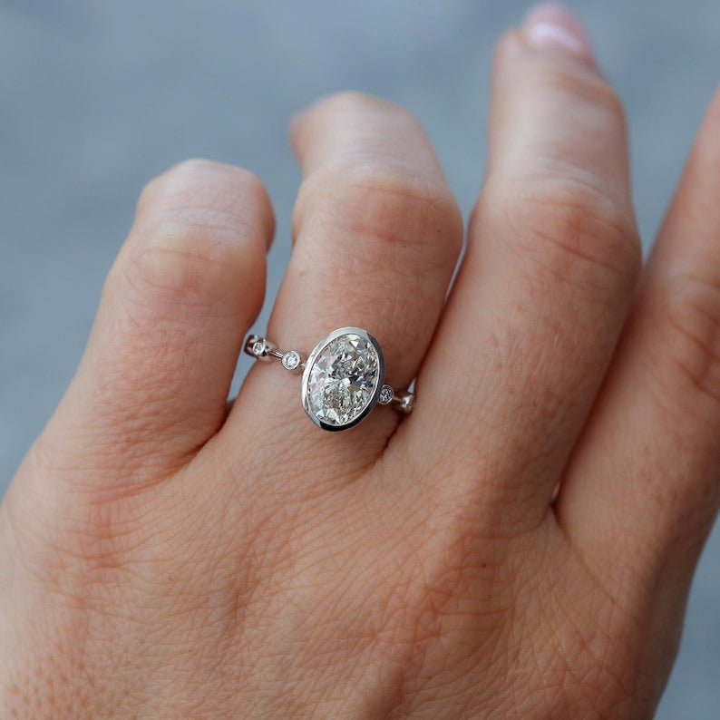 Oval Diamond Spaced Engagement Ring
