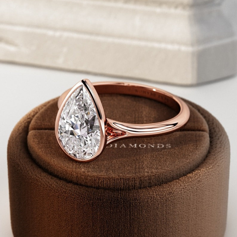 Carat E VVS2 Pear Lab Grown Diamond Bezel Set Ring
