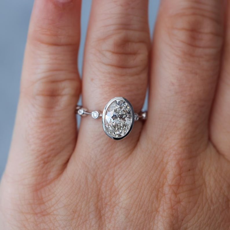Oval Diamond Spaced Engagement Ring