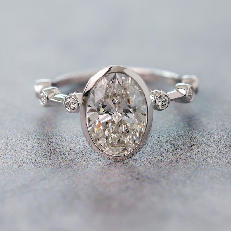 Oval Diamond Spaced Engagement Ring